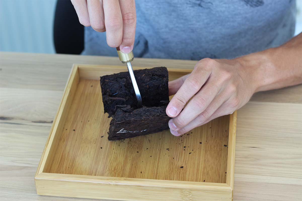 How to Break a Puerh Tea Brick – Tea Adventures